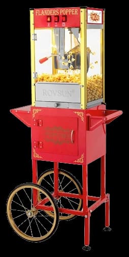 The popcorn machine on its red cart, its glass case full of popcorn